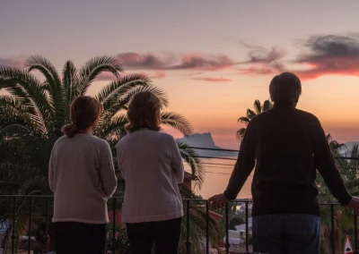 people looking at seaview sunset