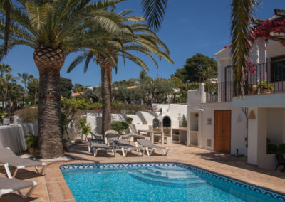swimming pool with loungers